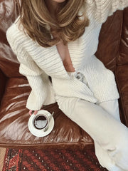 White knit coat with waterfall collar and flared sleeves