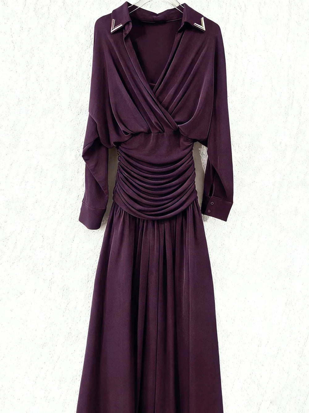 Purple maxi dress laid flat