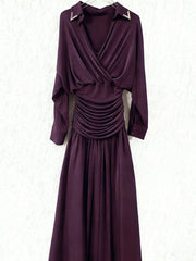 Purple maxi dress laid flat