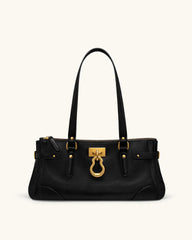 Black leather tote bag with gold lock detail and top handles