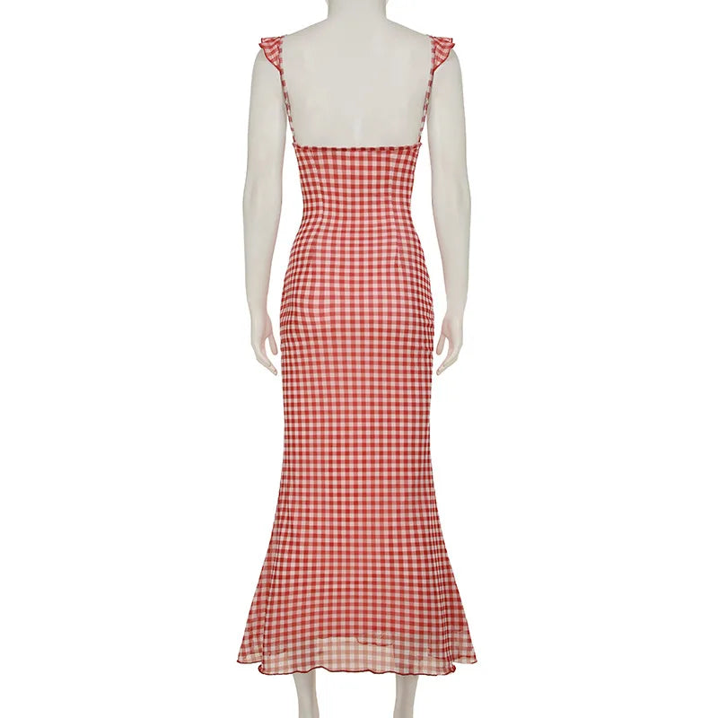Red and white checkered dress on a mannequin against a white background
