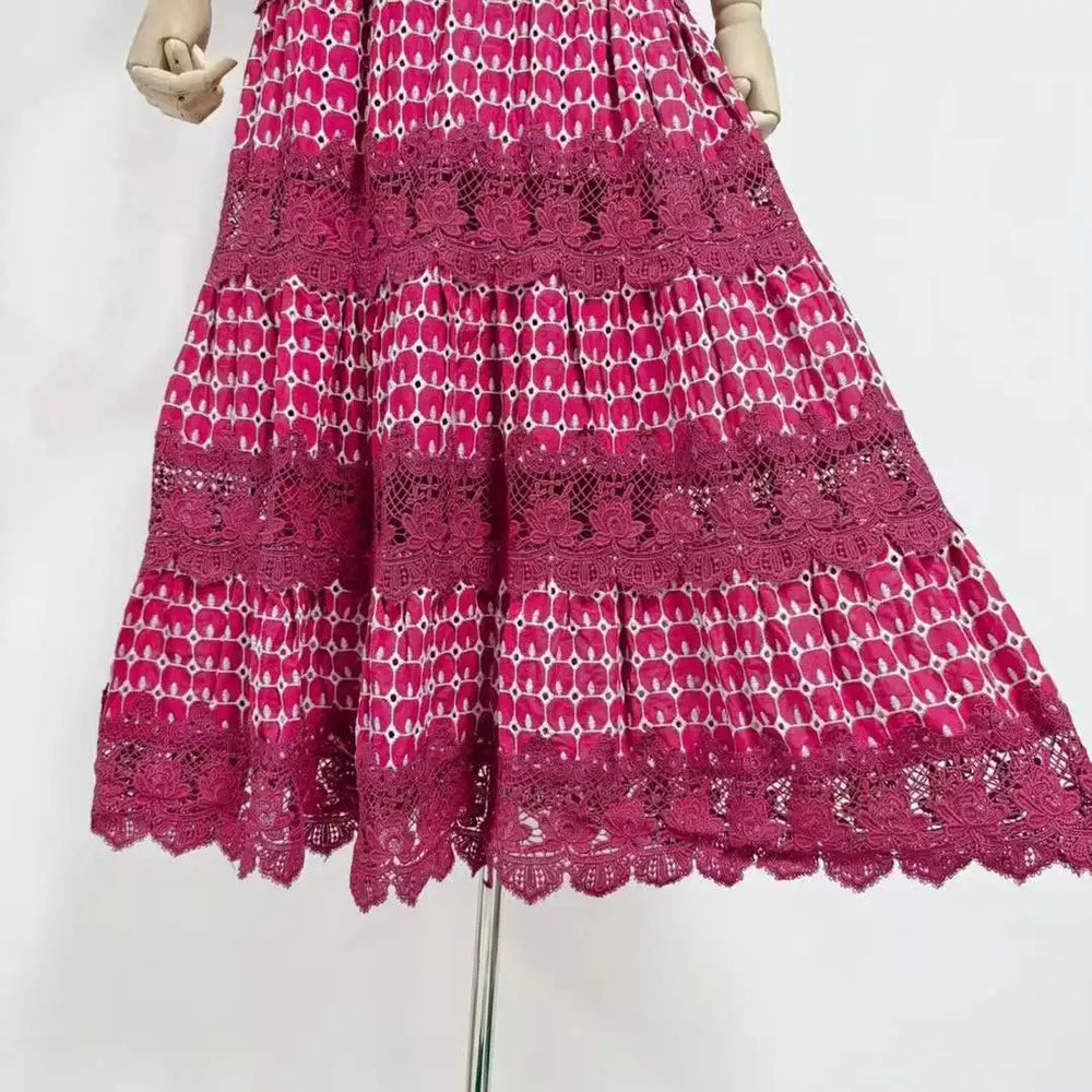 Close-up of lace mock neck short sleeve midi dress skirt hem