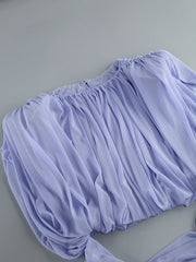 Light purple lace shorts on a gray background