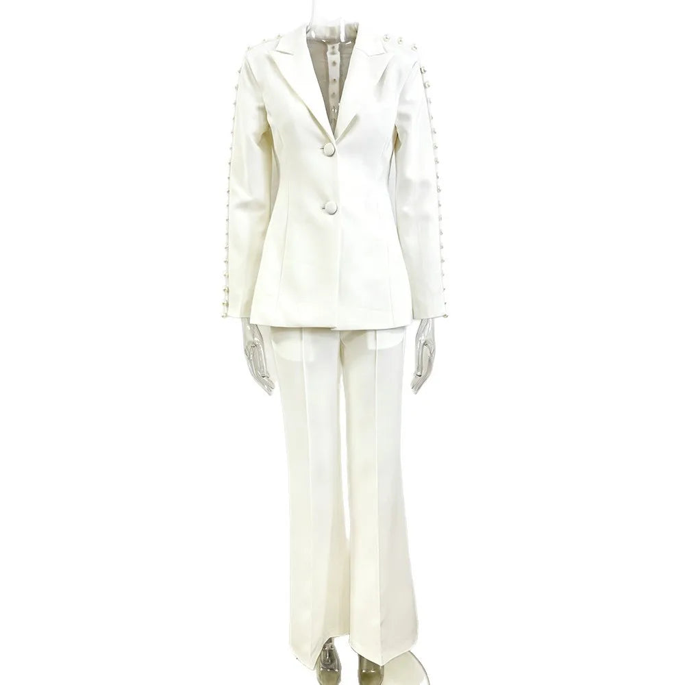 Pearl embellished mesh panel blazer and wide leg pants suit on mannequin