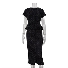 Black polka dot dress on a mannequin