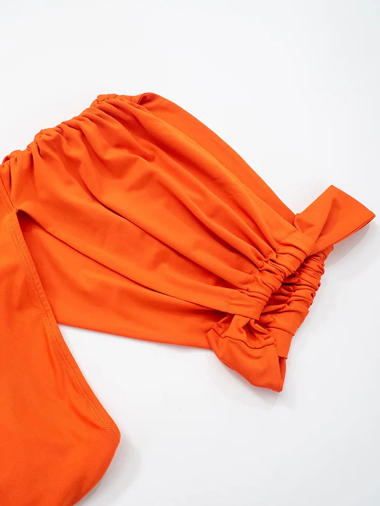 Orange fabric with a knot on a white background