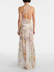 Back view of a one-shoulder ruffled print asymmetrical neckline sleeveless ankle-length sheath dress