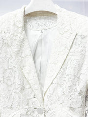 White lace blazer on a mannequin against a light gray background
