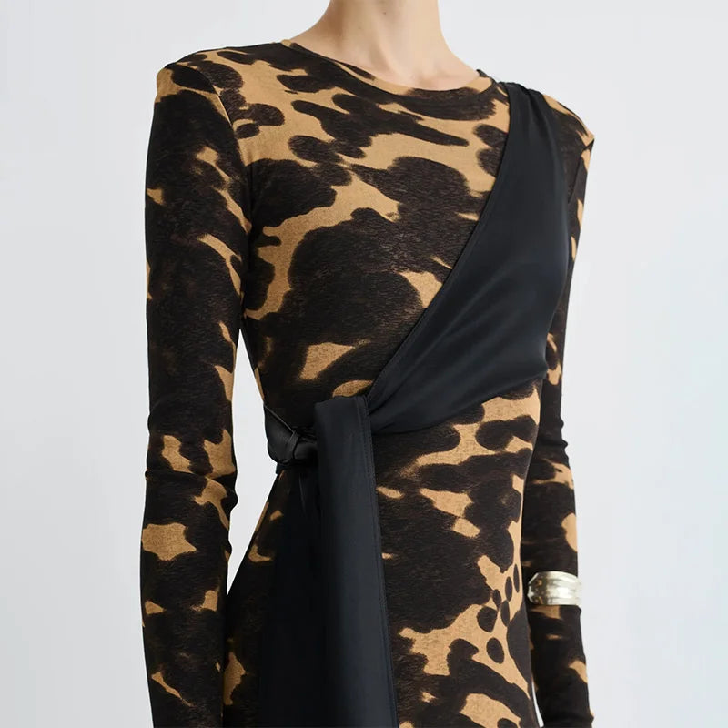 Leopard print dress with a black drape