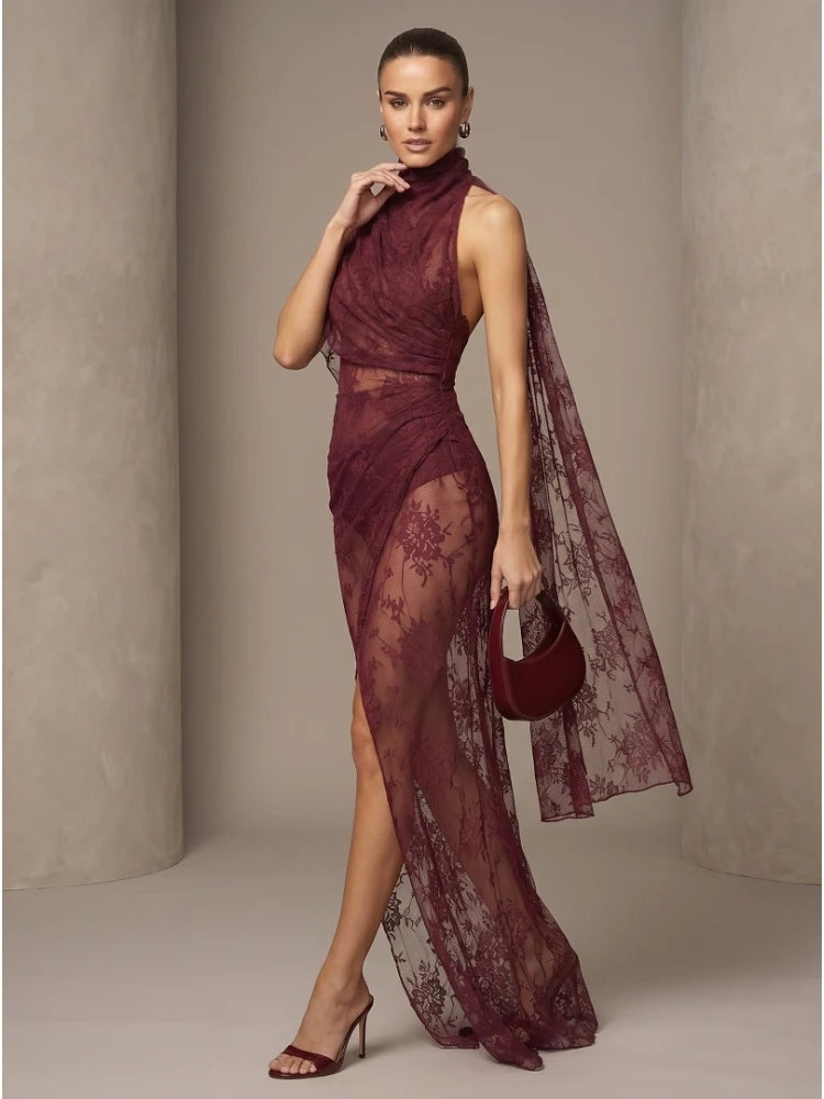 Side profile of model wearing high neck draped lace maxi dress