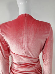 Pink velvet dress on a mannequin