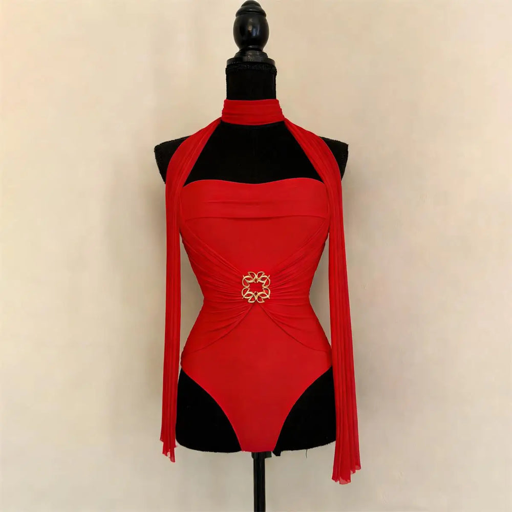 Red bandeau swimsuit with scarf detail on mannequin