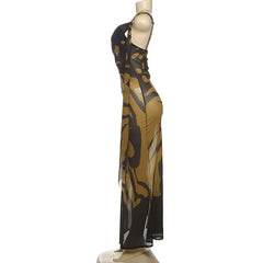 Mannequin wearing a long, patterned dress on a white background