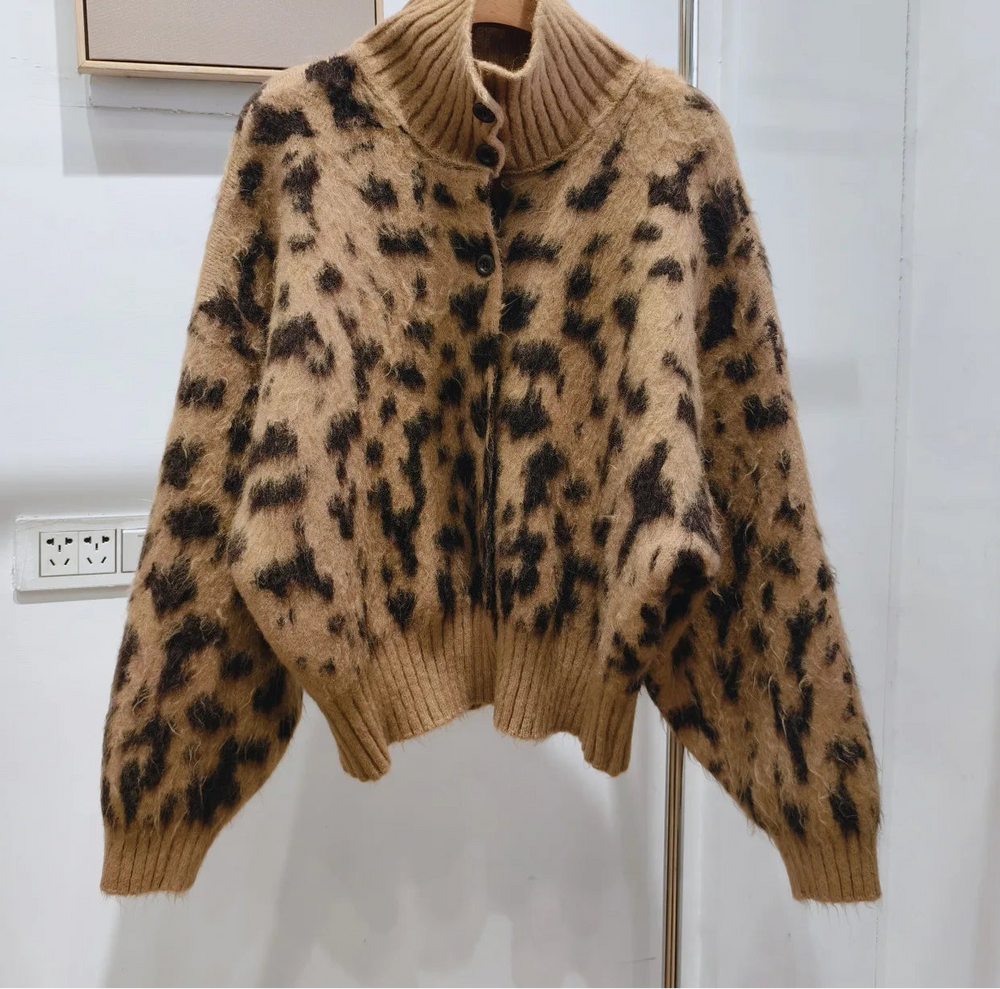 Close-up of leopard print knit coat
