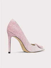 Pink glitter high heel shoe on a light gray background