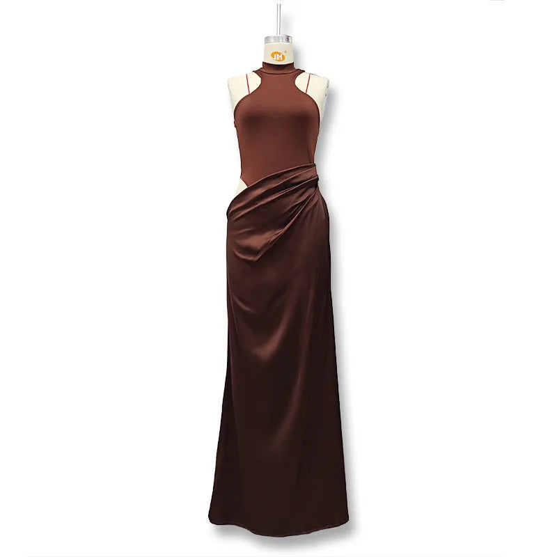 Brown evening gown on a mannequin against a white background
