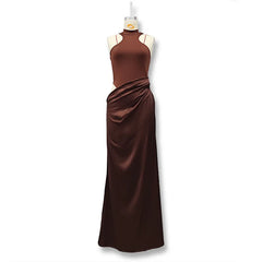 Brown evening gown on a mannequin against a white background