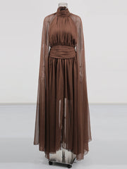 Brown dress on a mannequin against a white background