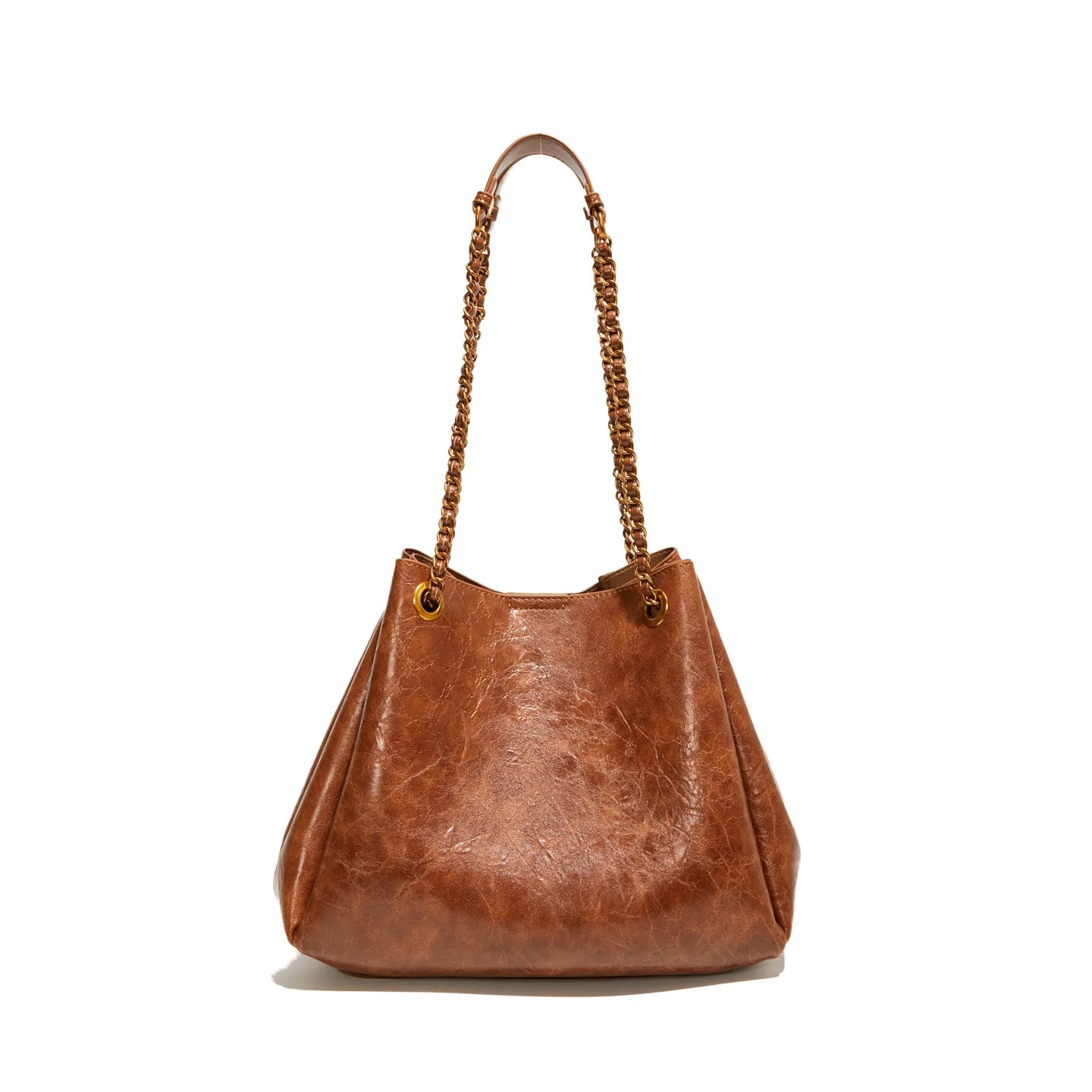 Brown leather handbag with braided handle