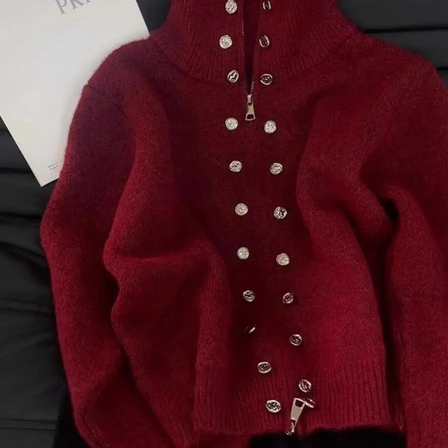 Close-up of buttons on mock neck zipper button knit top