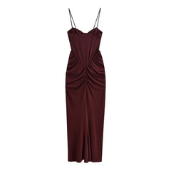Maroon evening gown with thin straps on a white background