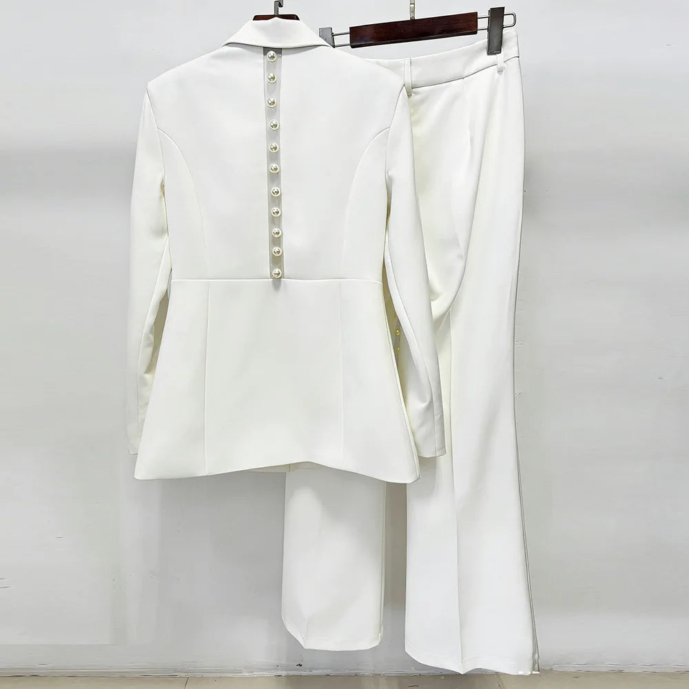 Back view of pearl embellished mesh panel blazer and wide leg pants suit on hangers