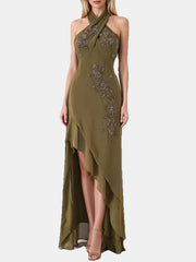 An olive green halter-neck maxi dress with floral embroidery and beadwork, featuring a high-low ruffled hem and a thigh-high slit, shown on a model against a white background.