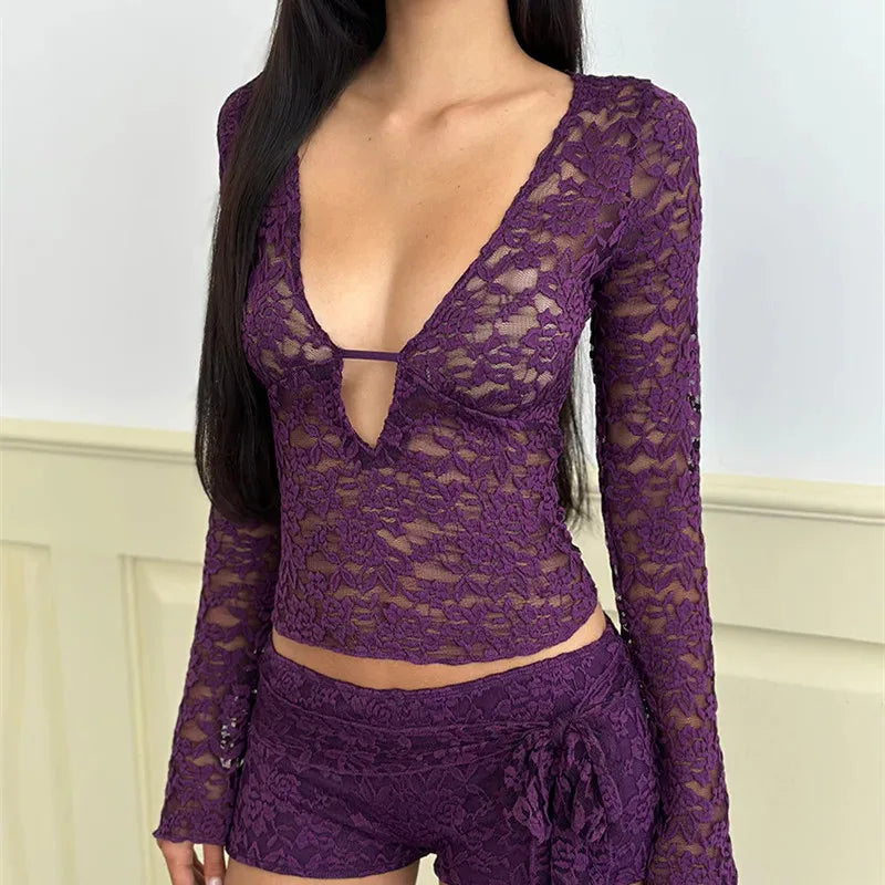 Purple lace long-sleeve top and shorts set on a neutral background