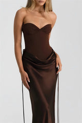Brown strapless gown on a white background