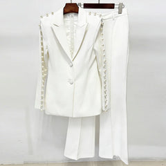 Pearl embellished mesh panel blazer and wide leg pants suit displayed on hangers
