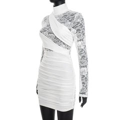 White dress with lace detailing on a mannequin against a white background