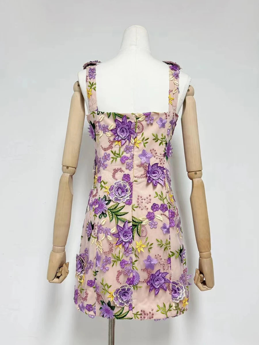 Floral dress on a mannequin against a white background