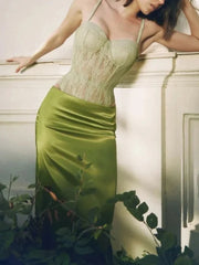 Lace corset bodysuit paired with a satin skirt