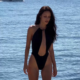 Solid high cut one piece swimsuit with cutout detail