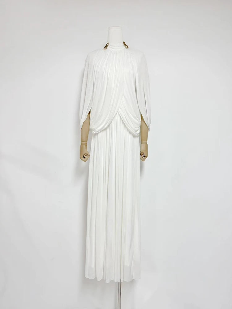 White dress on a mannequin against a white background