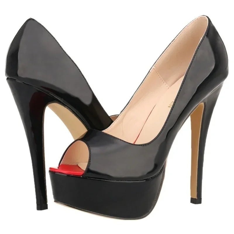Black high-heeled shoes with a red platform on a white background
