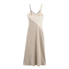 Beige slip dress on a white background