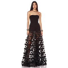 Strapless black maxi dress with dimensional floral appliques on skirt