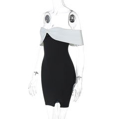 Black dress with white collar on a mannequin against a white background