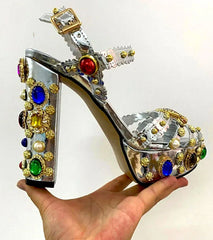 Close-up of silver embellished platform chunky heel sandals