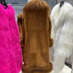 Brown fur coat with pink and white fur coats in the background