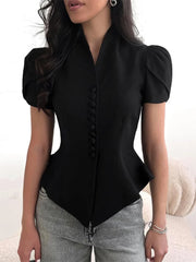 Black short-sleeve blouse with button details worn by a person