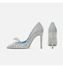 Pair of sparkling high-heeled shoes on a white background