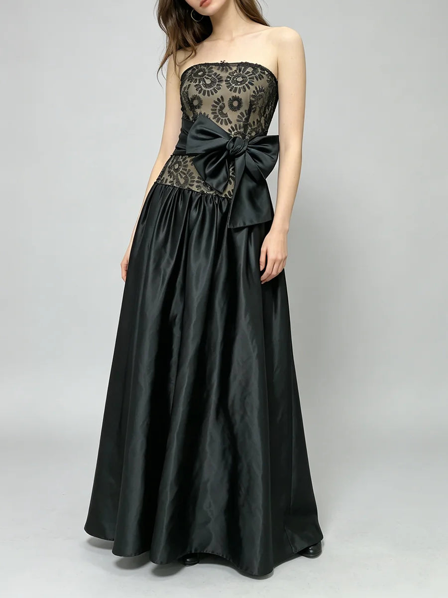 Strapless lace bodice full skirt gown with bow accent