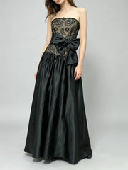 Strapless lace bodice full skirt gown with bow accent