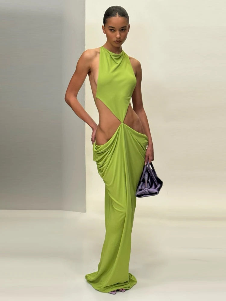 Cut-out halter maxi dress with draped skirt detail and handbag