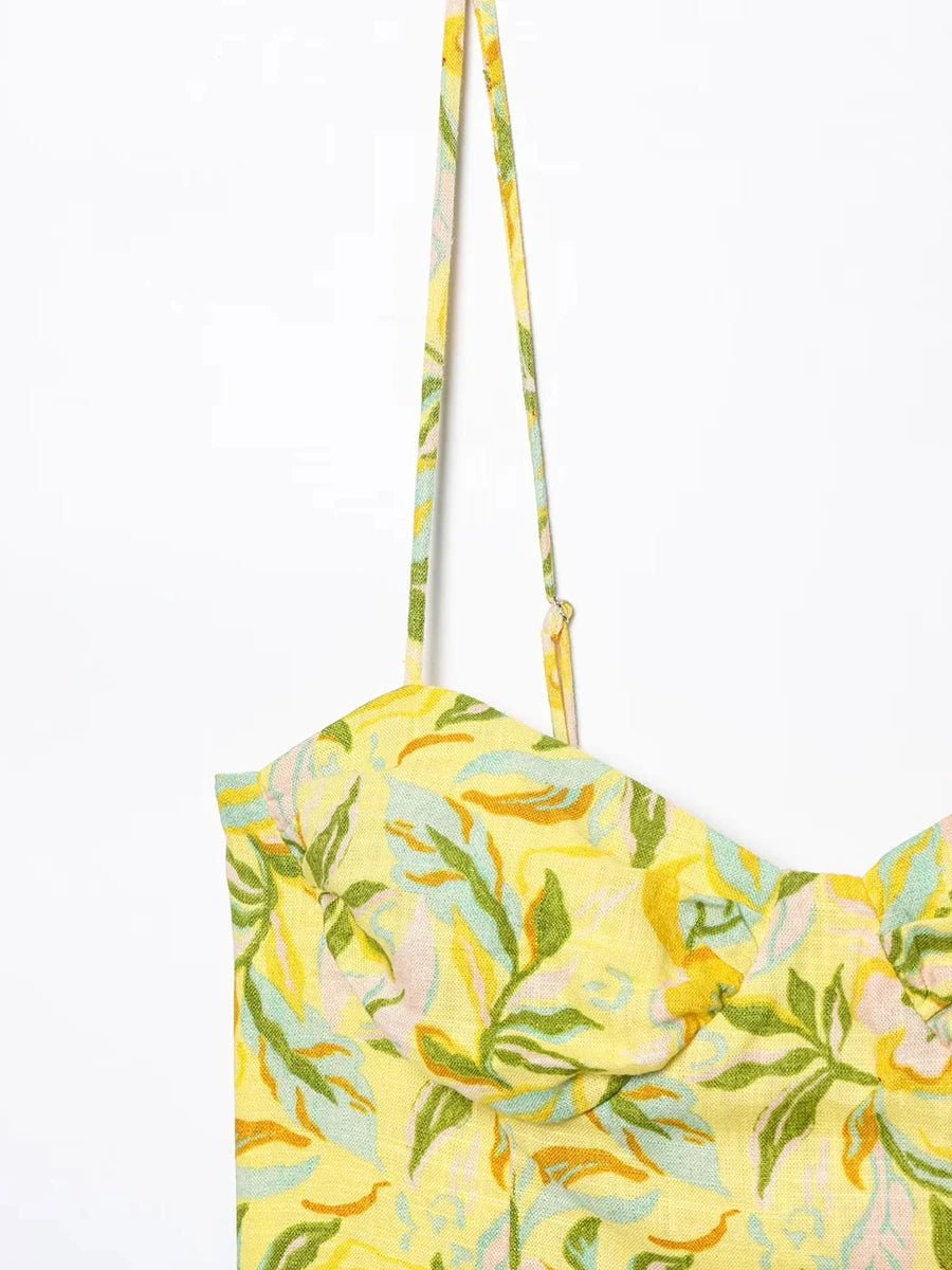 Yellow floral patterned bag on a white background