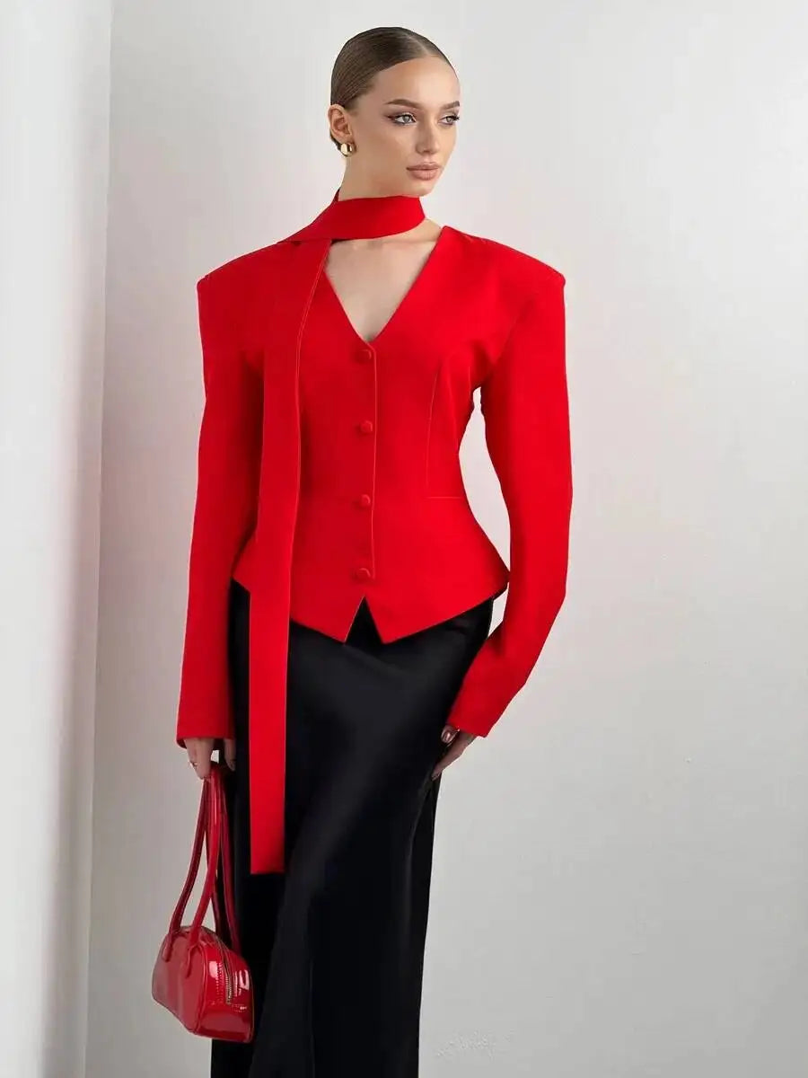 Red padded shoulder v-neck blazer with long sleeves and single-breasted buttons.
