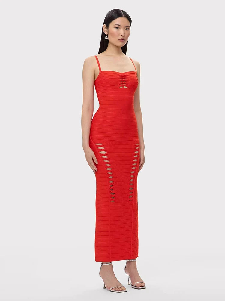 Red dress with cut-out sides worn by a model on a white background