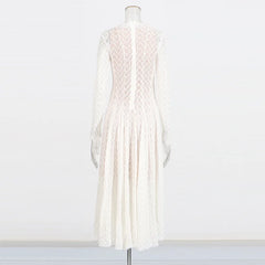 White lace dress on a mannequin against a white background